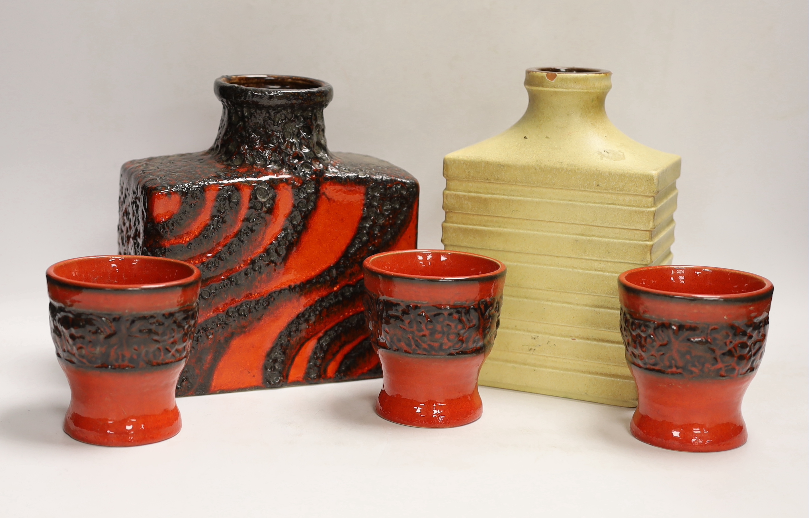 Five West German pottery items including a Scheurich vase, a Carstens vase and three beakers, tallest 20cm